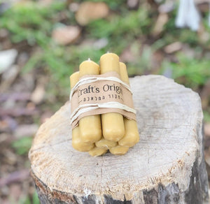 Seven hand dipped beeswax candles in natural color