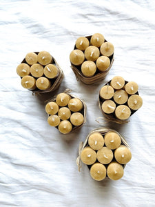 Seven hand dipped beeswax candles in natural color