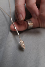 Load image into Gallery viewer, Long silver necklace with delicate dangling charm - ambartique
